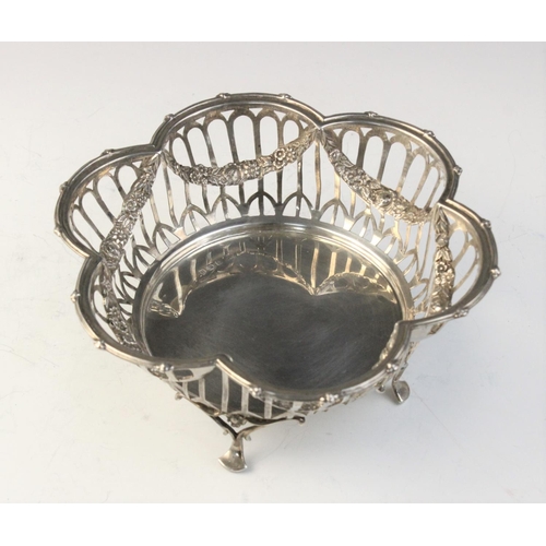 28 - An Edwardian silver bon-bon dish by Henry Matthews, Birmingham 1908, of lobed hexagonal 'flower head... 