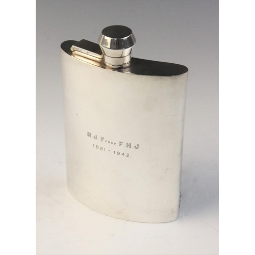 29 - A George V silver hip flask by F Burton Crosbee, Birmingham 1942, of curved rectangular form with ba... 