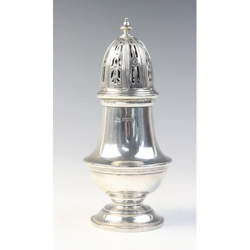 30 - A George V silver sugar caster by Elkington & Co, Birmingham 1928, of  baluster form with reeded bor... 
