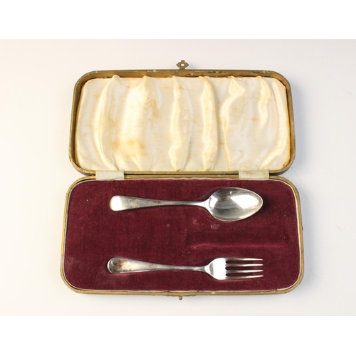 38 - A boxed silver Christening set by Adie Brothers, Birmingham 1938, comprising egg cup, spoon and napk... 