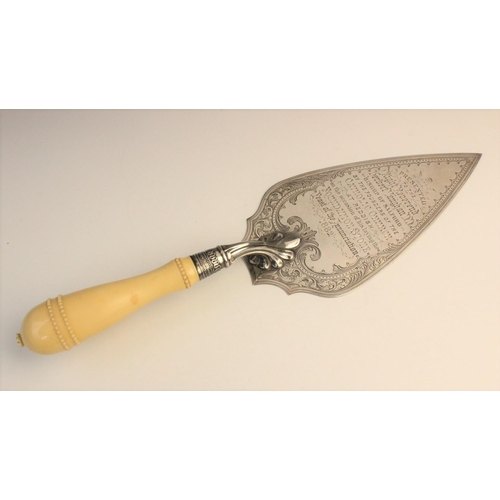 47 - A Victorian silver presentation trowel by William Hutton & Sons, London 1876, the carved ivory handl... 