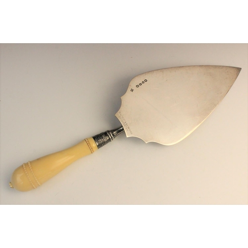 47 - A Victorian silver presentation trowel by William Hutton & Sons, London 1876, the carved ivory handl... 