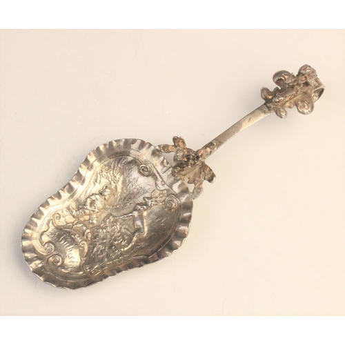 60 - A Victorian (possibly German) silver caddy spoon, marked for Berthold Muller, London 1897, the bowl ... 