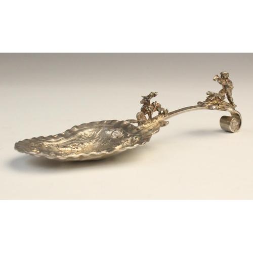 60 - A Victorian (possibly German) silver caddy spoon, marked for Berthold Muller, London 1897, the bowl ... 