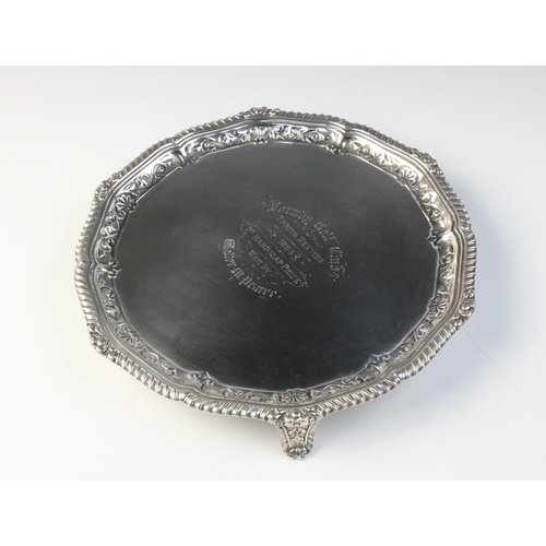 7 - GOLFING INTEREST: A Victorian silver salver by Josiah Williams & Co, London 1893, with reeded and em... 