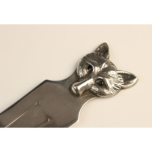 70 - A Sampson Mordan silver bookmark, dated Chester 1913, of plain polished tapered form with fox mask t... 