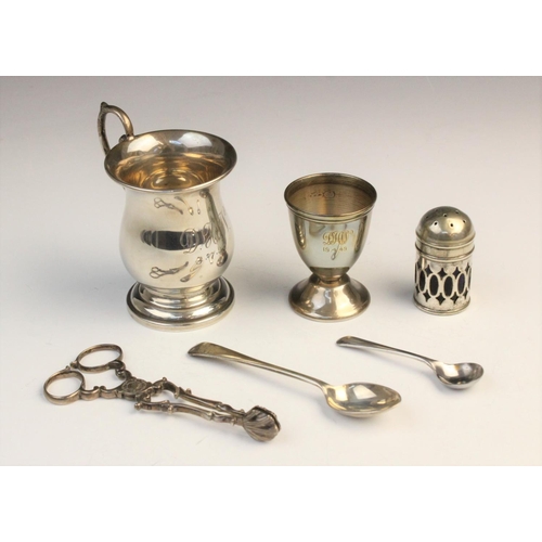 74 - A selection of silver tableware, to include a silver christening cup by Bishton's Ltd, Birmingham 19... 