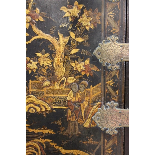 742 - A Chinoiserie lacquered cabinet on stand, 17th/18th century, the painted European wood and gesso Roc... 