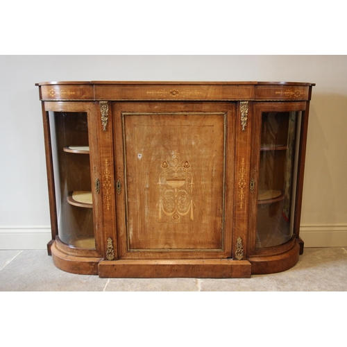 750 - A Victorian inlaid walnut credenza, the frieze inlaid with satinwood foliate motifs above a central ... 