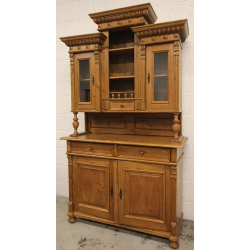 751 - A Victorian style pine kitchen dresser, late 20th century, the turreted high back with central open ... 