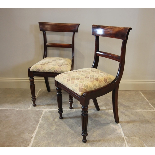 752 - A set of six William IV mahogany dining chairs, each with a concave rail back above an upholstered d... 