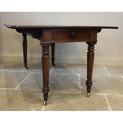 753 - A mid 19th century Pembroke table, the rectangular drop leaf top with rounded corners, above a singl... 