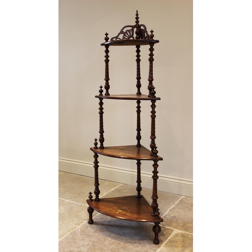 757 - A Victorian walnut freestanding corner what-not, with a fret work gallery over four graduated tiers,... 