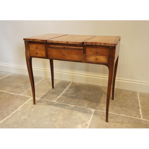 771 - A late 19th century French kingwood dressing chest, three hinged panels above five drawers upon slen... 