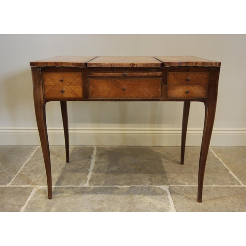 771 - A late 19th century French kingwood dressing chest, three hinged panels above five drawers upon slen... 