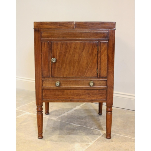 773 - A George III and later mahogany cellarette, converted from a commode chest, the twin hinged top open... 