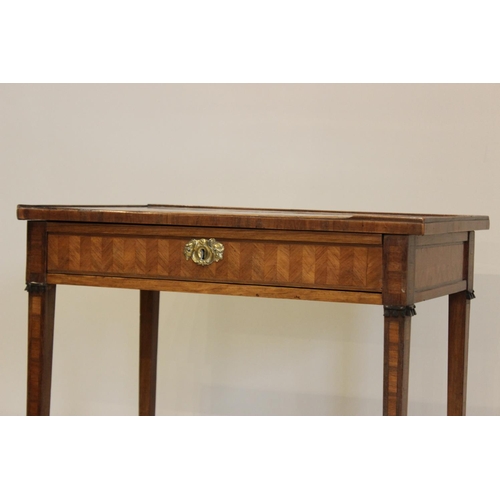 774 - A late 19th century kingwood writing table, the rectangular sliding top with a central herringbone p... 