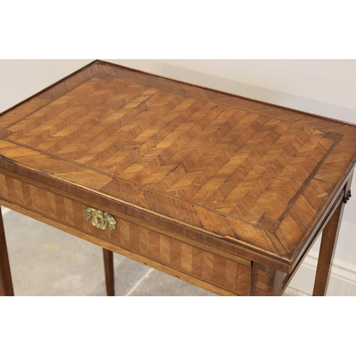 774 - A late 19th century kingwood writing table, the rectangular sliding top with a central herringbone p... 