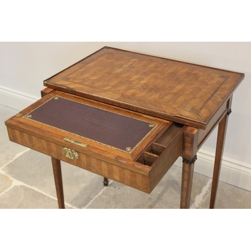 774 - A late 19th century kingwood writing table, the rectangular sliding top with a central herringbone p... 