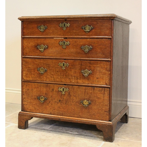 775 - A 19th century oak bachelor’s chest, the rectangular thumb moulded top above four graduated long dra... 