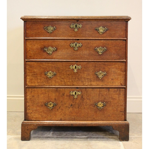 775 - A 19th century oak bachelor’s chest, the rectangular thumb moulded top above four graduated long dra... 