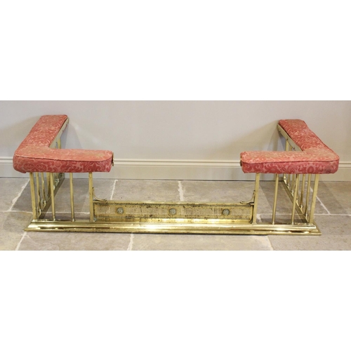 795 - An early 20th century brass and upholstered club fender, of typical angular form, the upholstered se... 