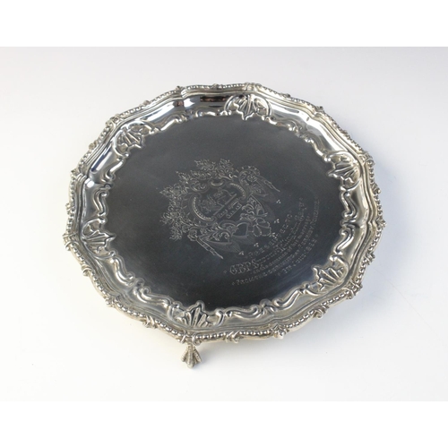8 - A Victorian silver salver by Martin, Hall & Co, London 1890, of circular from with beaded and emboss... 