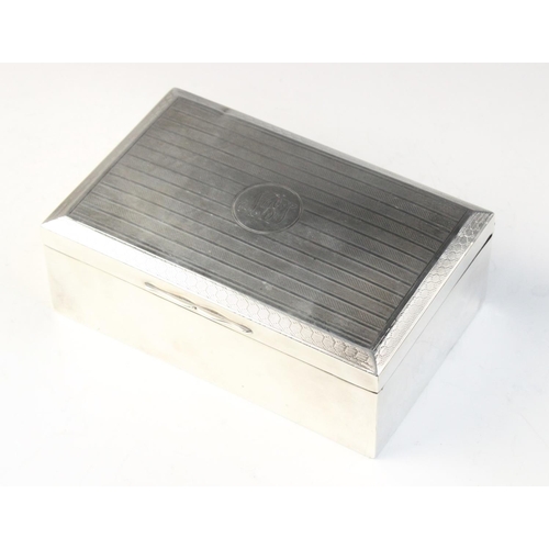 82 - A George V silver mounted cigarette box by Henry Matthews, Birmingham 1922, of rectangular form with... 