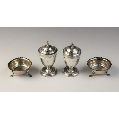 88 - A pair of George V silver pepperettes by S Blanckensee & Son Ltd, Birmingham 1914, each of urn form ... 