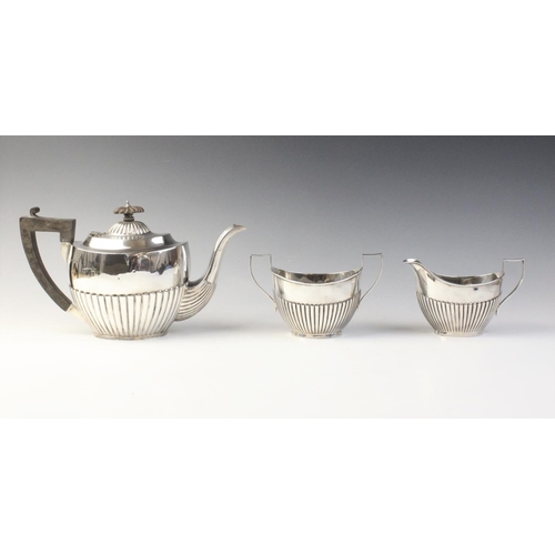 92 - A George V three-piece silver tea service by Charles S Green & Co Ltd, Birmingham 1925, comprising t... 