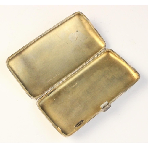 94 - A George V silver cigar case by Hirst Brothers & Co Ltd, Birmingham 1915, of curved rectangular form... 