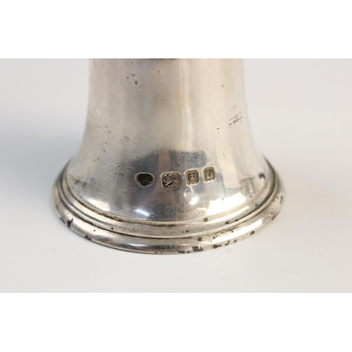 91 - A George V silver bell by Goldsmiths & Silversmiths Co, London 1934, 6.4cm high, together with a set... 