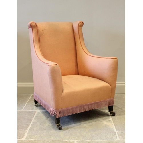 804 - An Edwardian tub chair, raised on legs of tapering square section, coral coloured upholstery, 92cm h... 