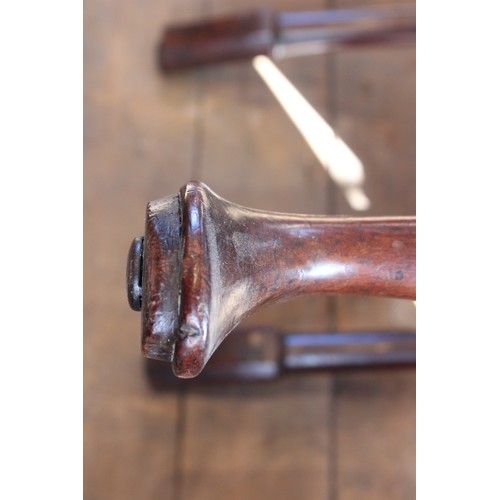 678 - A pair of George I walnut side chairs, each with a vase shaped splat over a drop in upholstered seat... 