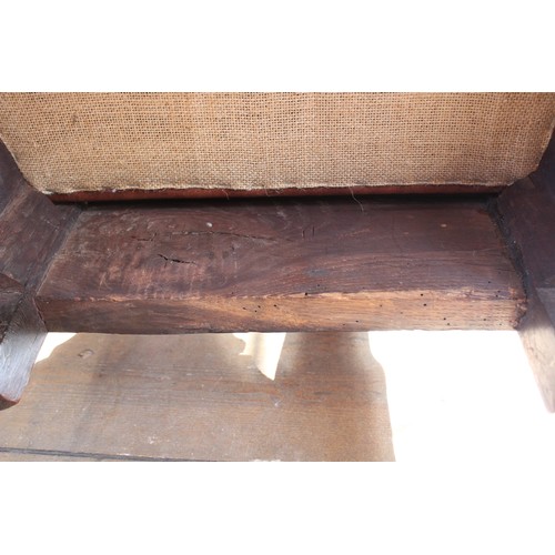 678 - A pair of George I walnut side chairs, each with a vase shaped splat over a drop in upholstered seat... 