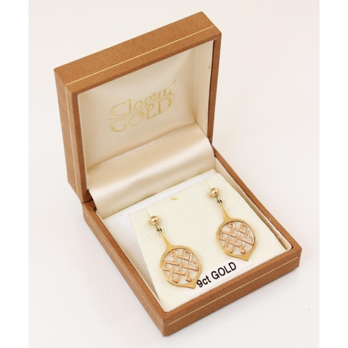 103 - A pair of 9ct gold Clogau Celtic style earrings, each designed as a rose gold Celtic knot set to a y... 