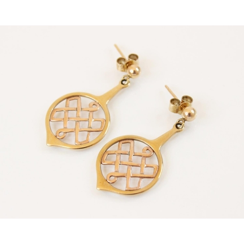 103 - A pair of 9ct gold Clogau Celtic style earrings, each designed as a rose gold Celtic knot set to a y... 