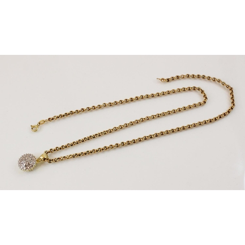 117 - A 9ct gold figaro link chain, with lobster claw and loop fastening, 51cm long, suspending a yellow m... 