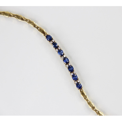 125 - A sapphire doublet and diamond set line bracelet, comprising seven oval mixed cut sapphire doublets,... 