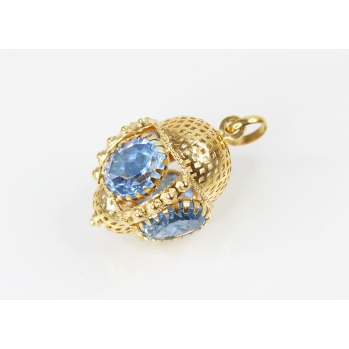 126 - A Victorian style 18ct gold paste set fob charm, comprising four oval mixed cut blue paste, (each me... 