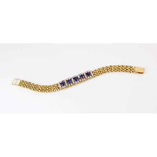 129 - A sapphire and diamond bracelet, comprising five untested oval mixed cut sapphires, (measuring betwe... 