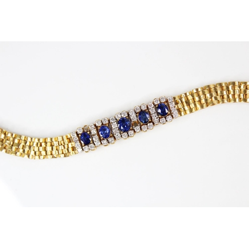 129 - A sapphire and diamond bracelet, comprising five untested oval mixed cut sapphires, (measuring betwe... 