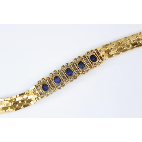 129 - A sapphire and diamond bracelet, comprising five untested oval mixed cut sapphires, (measuring betwe... 