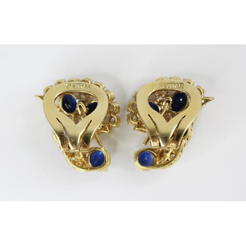 134 - A pair of sapphire and diamond spray earrings by Gazdar, each comprising three oval mixed cut sapphi... 