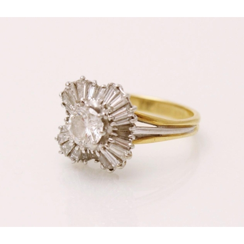 136 - A diamond ballerina cluster ring, the central round brilliant cut diamond (weighing approximately 0.... 