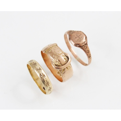 142 - A 9ct gold buckle ring, marks for Birmingham 1918, ring size M, together with a 9ct gold signet ring... 