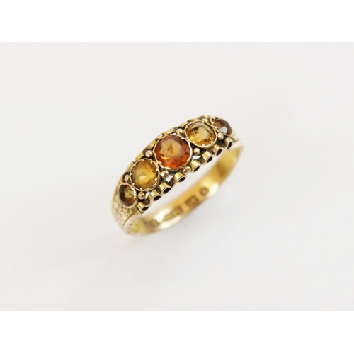 149 - A Victorian 15ct gold five stone ring, comprising a central round mixed cut hessonite garnet (measur... 