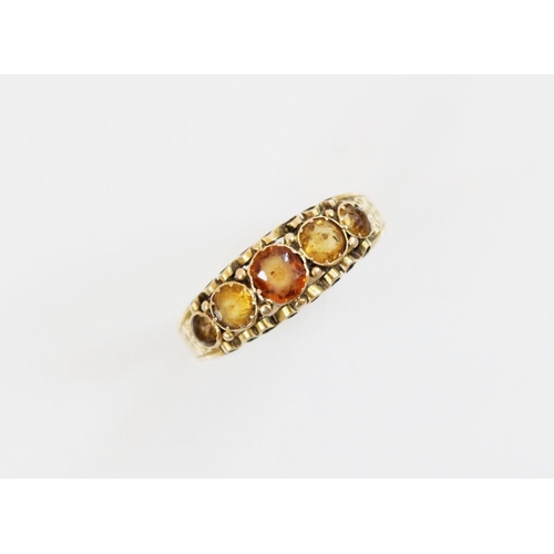 149 - A Victorian 15ct gold five stone ring, comprising a central round mixed cut hessonite garnet (measur... 