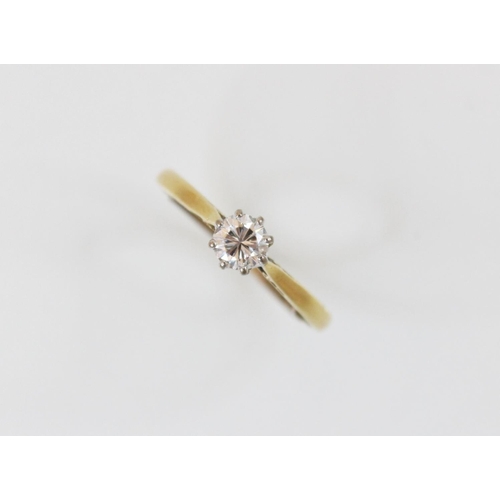 159 - A diamond solitaire ring, the central round brilliant cut diamond (weighing approximately 0.45 carat... 