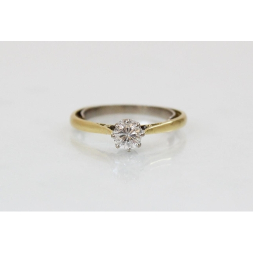 159 - A diamond solitaire ring, the central round brilliant cut diamond (weighing approximately 0.45 carat... 